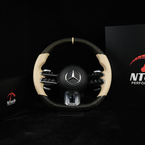 Mercedes Carbon-Lenkrad (gewebt) mit beigen Ledergriffen – Mercedes Klasse A, C, E, CLA, GLA, GLE, GLS ab Bj. 2018+
